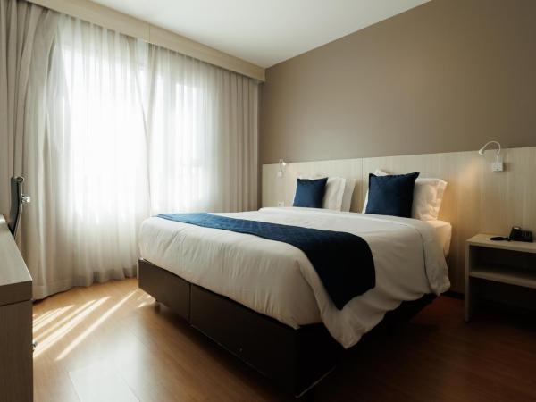 eSuites Belo Horizonte Minascasa : photo 10 de la chambre chambre lit queen-size deluxe