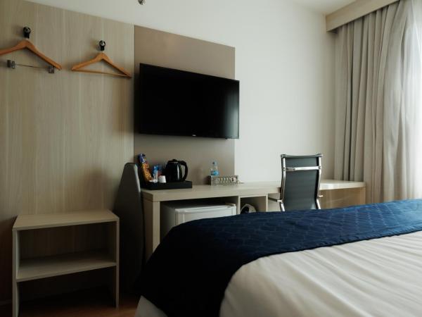 eSuites Belo Horizonte Minascasa : photo 7 de la chambre chambre lit queen-size deluxe