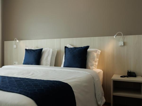 eSuites Belo Horizonte Minascasa : photo 6 de la chambre chambre lit queen-size deluxe