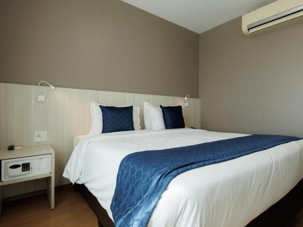 eSuites Belo Horizonte Minascasa : photo 5 de la chambre chambre lit queen-size deluxe