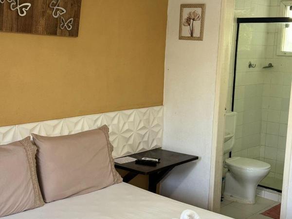 Lua Nova Ferradurinha Buzios : photo 9 de la chambre chambre double - vue sur jardin