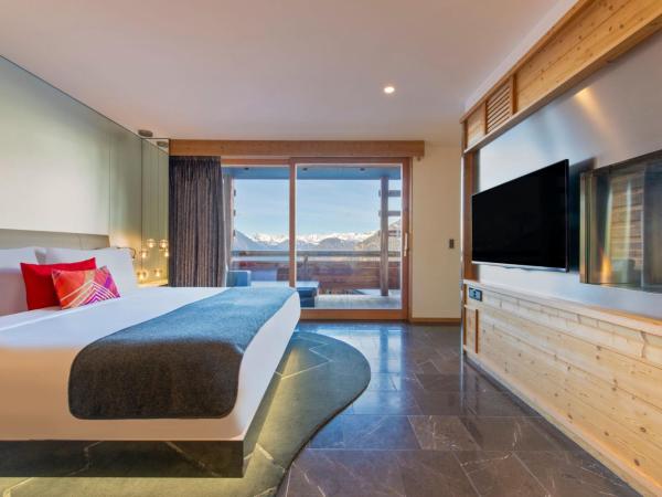 W Verbier : photo 5 de la chambre fantastique suite lit king-size avec balcon et cheminée