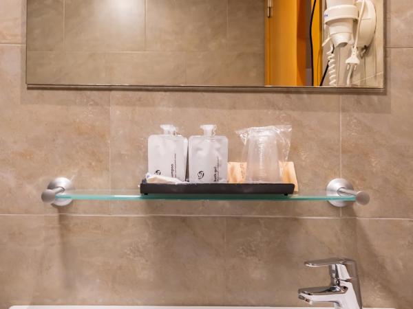 La City Estación : photo 5 de la chambre chambre lits jumeaux