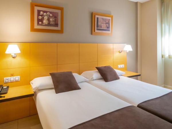 La City Estación : photo 10 de la chambre chambre lits jumeaux