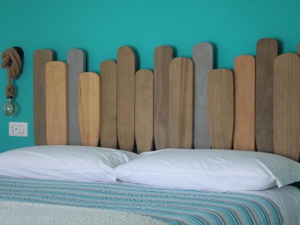 LIDO DEL FARO : photo 3 de la chambre chambre lit queen-size - vue sur mer