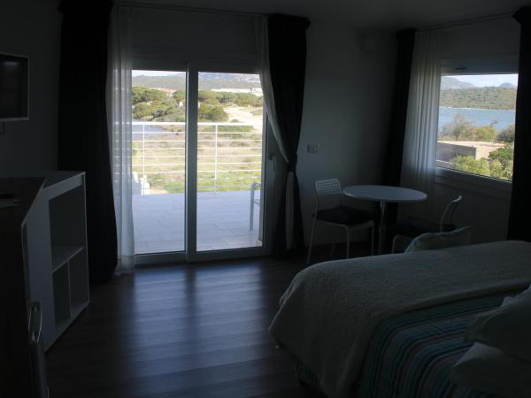 LIDO DEL FARO : photo 4 de la chambre chambre lit queen-size - vue sur mer