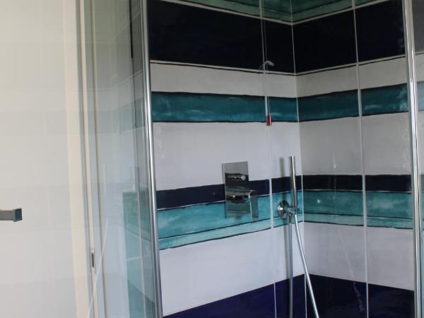 LIDO DEL FARO : photo 6 de la chambre chambre lit queen-size - vue sur mer