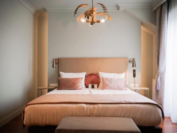 Queen's Court Hotel & Residence : photo 1 de la chambre suite royale