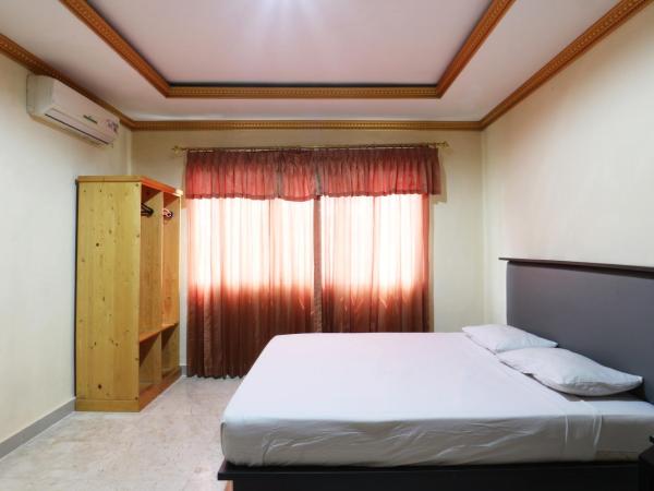 Jambrut Inn : photo 3 de la chambre grande chambre double