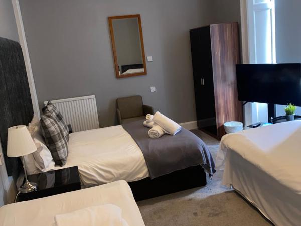 Ellwyn House : photo 1 de la chambre chambre quadruple premium