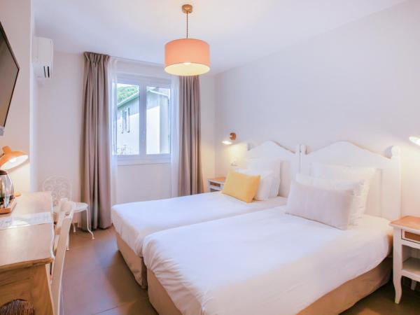 Hotel La Bienvenue : photo 2 de la chambre chambre - vue sur cour