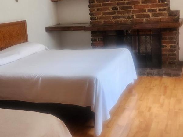 Anys Hostal : photo 5 de la chambre chambre lits jumeaux