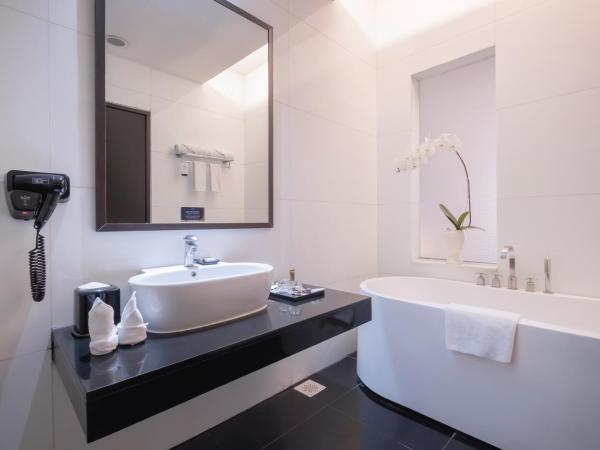 Merlynn Park Hotel : photo 1 de la chambre chambre lit king-size exécutive