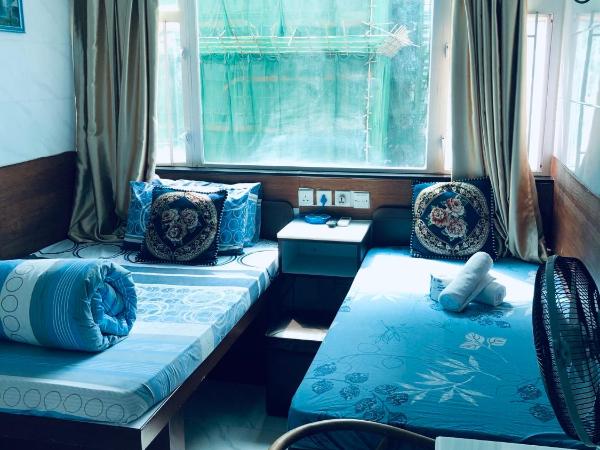 Asia inn (Block B) : photo 1 de la chambre chambre triple deluxe - vue sur mer