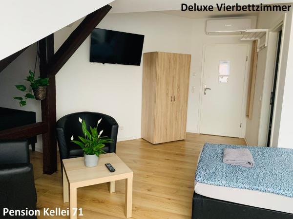 Pension Kellei 71 : photo 2 de la chambre chambre quadruple deluxe