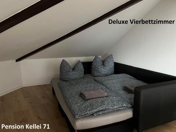 Pension Kellei 71 : photo 5 de la chambre chambre quadruple deluxe