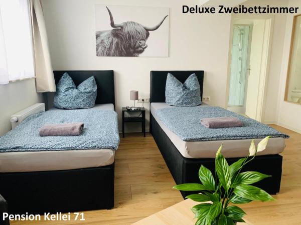 Pension Kellei 71 : photo 4 de la chambre chambre lits jumeaux deluxe