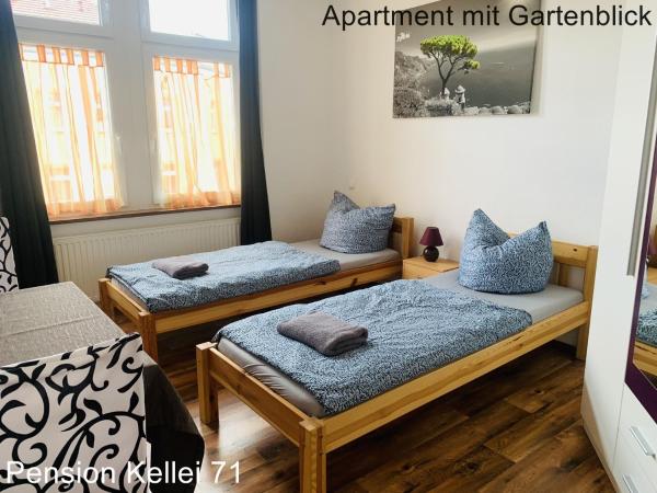 Pension Kellei 71 : photo 7 de la chambre appartement - vue sur jardin