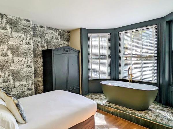 INNit Bliss : photo 3 de la chambre chambre double deluxe avec baignoire