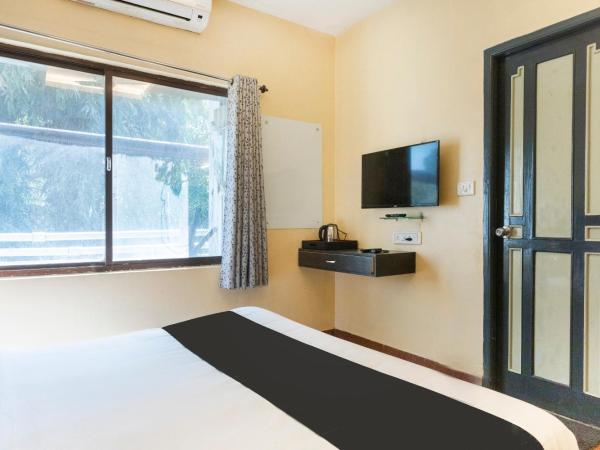 Collection O Santhome Residency Near Marina Beach : photo 3 de la chambre chambre double standard