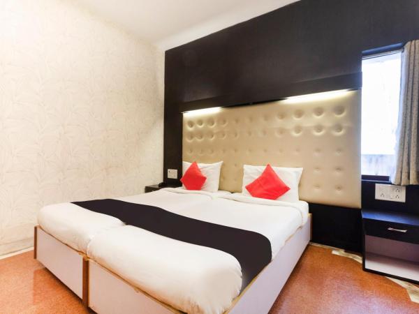 Collection O Santhome Residency Near Marina Beach : photo 1 de la chambre chambre double standard