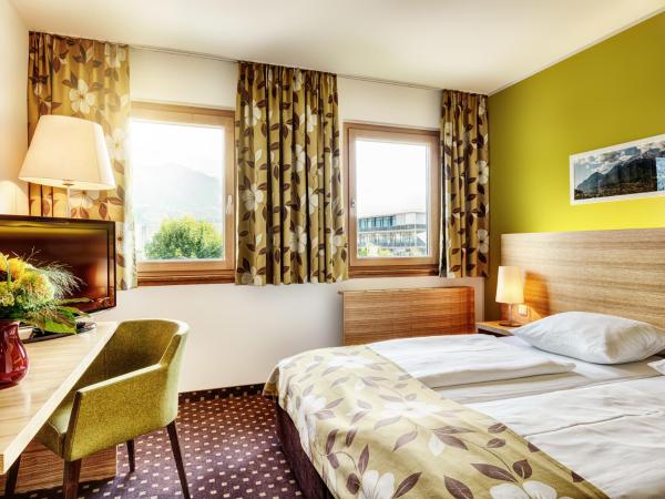 Alphotel Innsbruck : photo 1 de la chambre chambre double ou lits jumeaux avec place de parking