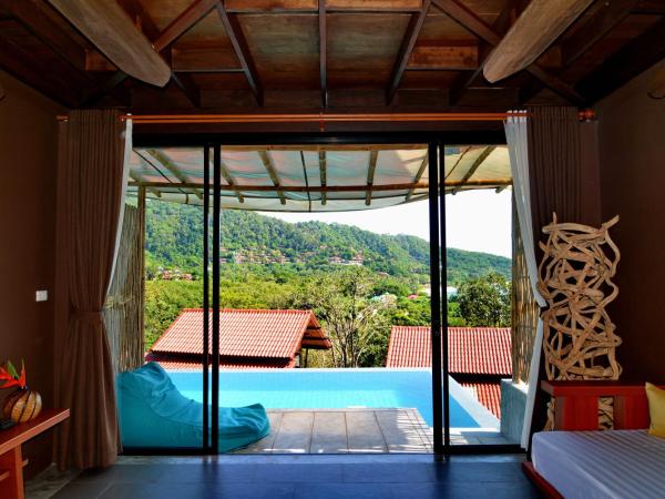 Alama Sea Village Resort - SHA Extra Plus : photo 1 de la chambre 2 chambres avec accès à la piscine