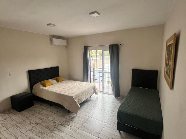 Tempo Suites : photo 1 de la chambre chambre triple