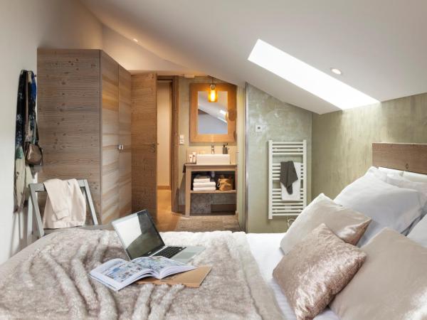 Résidence Pierre & Vacances Premium L'Hévana : photo 6 de la chambre appartement 3 chambres avec cheminée et sauna (8 personnes)