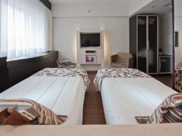 Mercure Sao Paulo Bela Vista : photo 3 de la chambre appartement supérieur avec lits jumeaux