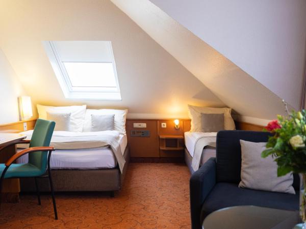 Hotel Garden Bremen : photo 2 de la chambre chambre quadruple