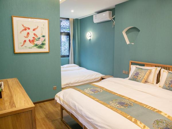 Rong Hotel - Beijing Nanluoguxiang Branch : photo 1 de la chambre chambre familiale cour