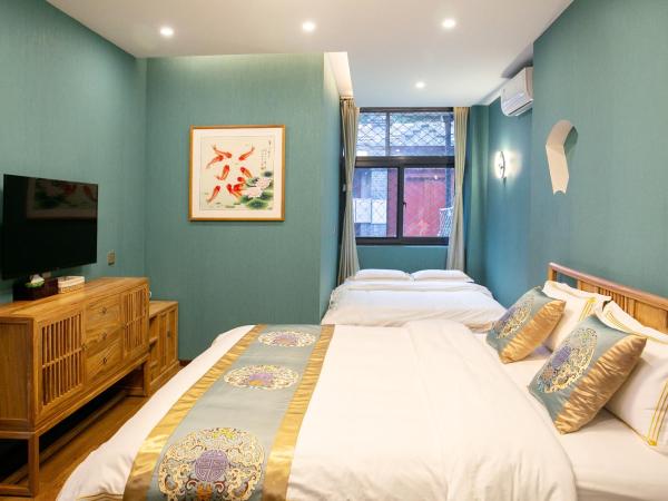 Rong Hotel - Beijing Nanluoguxiang Branch : photo 3 de la chambre chambre familiale cour