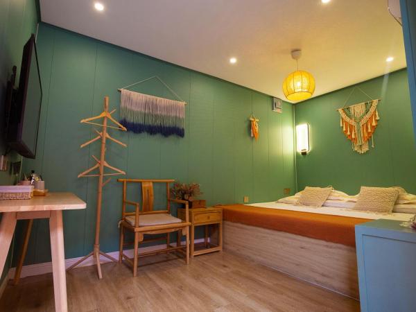 Rong Hotel - Beijing Nanluoguxiang Branch : photo 10 de la chambre chambre quadruple en duplex