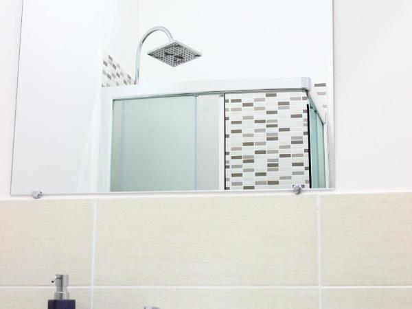 Palazzo San Vincenzo : photo 2 de la chambre chambre triple avec salle de bains privative