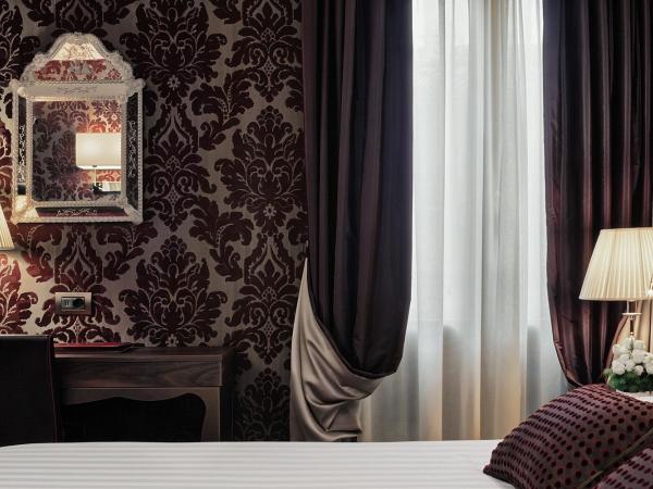 Hotel American-Dinesen : photo 3 de la chambre chambre triple classique