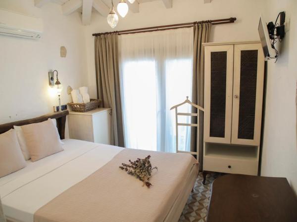 Filizce Alaçatı : photo 1 de la chambre chambre lit queen-size