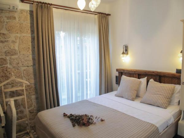 Filizce Alaçatı : photo 1 de la chambre chambre deluxe