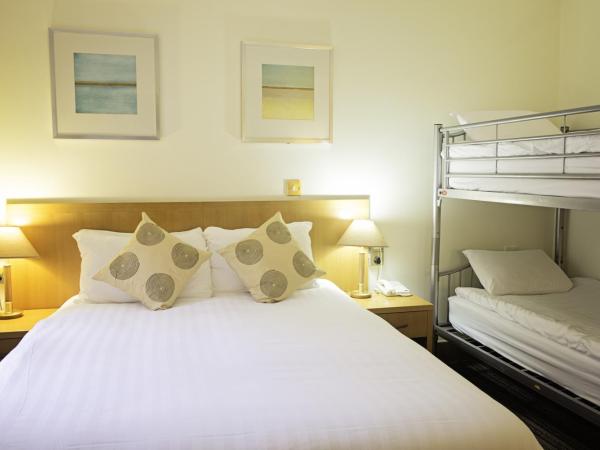 Carousel Hotel : photo 2 de la chambre chambre familiale (2 adultes et 2 enfants)