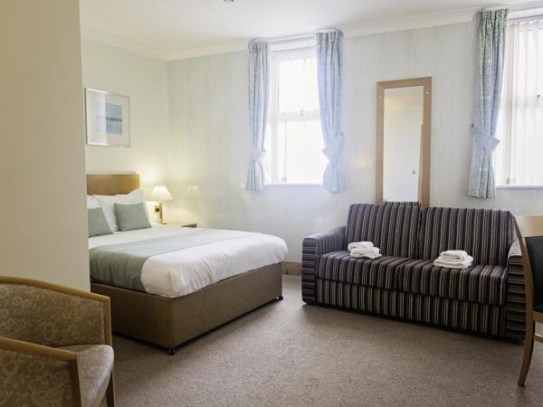 Carousel Hotel : photo 1 de la chambre chambre familiale (2 adultes + 2 enfant) - vue sur mer