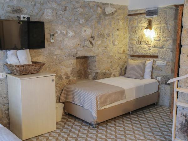 Filizce Alaçatı : photo 4 de la chambre chambre quadruple