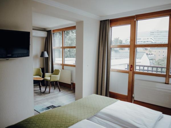 Parkhotel Brunauer : photo 7 de la chambre chambre supérieure - vue sur jardin