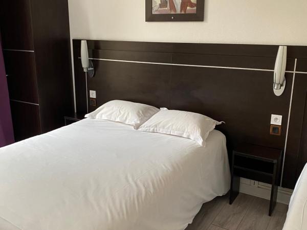 Hôtel Le Home Saint Louis : photo 3 de la chambre chambre triple