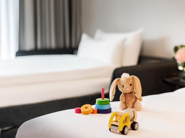 NH Berlin Kurfürstendamm : photo 3 de la chambre standard room with extra bed (2 adults + 1 child)