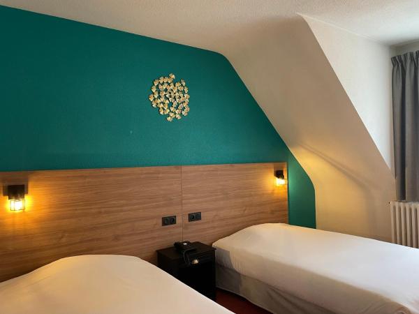Hotel Le Progres : photo 1 de la chambre chambre lits jumeaux