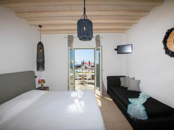 Aeolos Resort : photo 1 de la chambre aile coucher de soleil - chambre double - vue sur mer