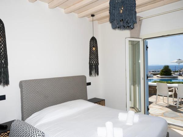 Aeolos Resort : photo 10 de la chambre aile coucher de soleil - chambre double - vue sur mer