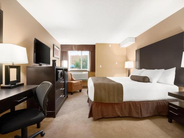 Days Inn by Wyndham Calgary Northwest : photo 3 de la chambre chambre lit queen-size avec baignoire - non-fumeurs