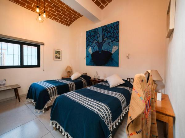 LARIMAR Gallery y Hotel Boutique : photo 6 de la chambre chambre lit king-size standard