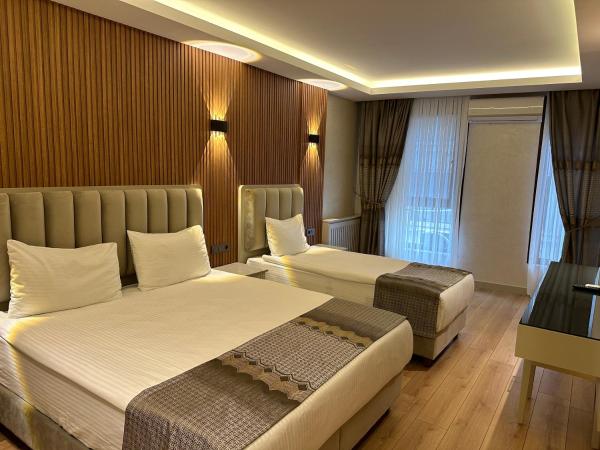 Kupeli Hotel : photo 4 de la chambre chambre triple deluxe